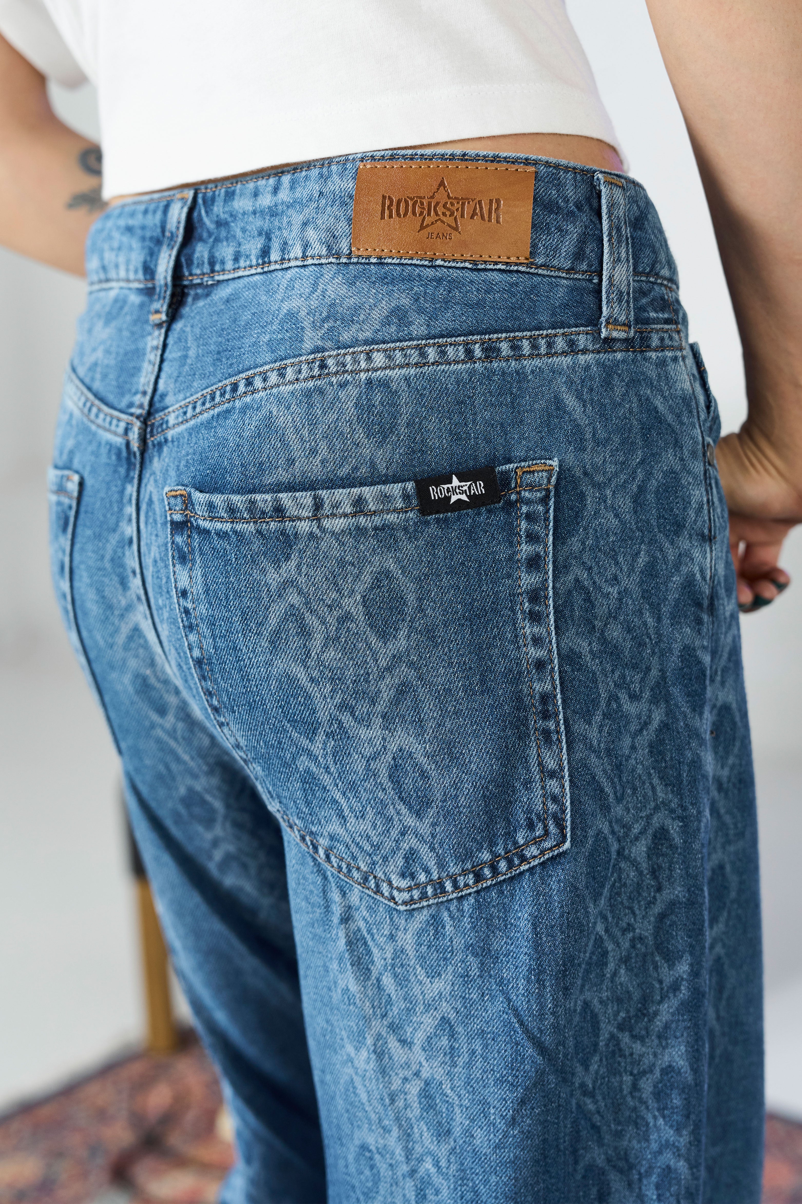 Snake Strike Laser Jeans